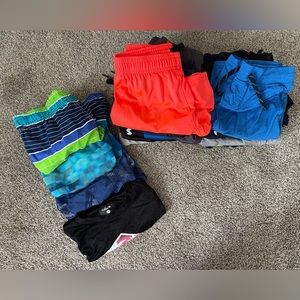 14 pair of shorts
3 pair of swim trunks
1 long sleeve swim shirt